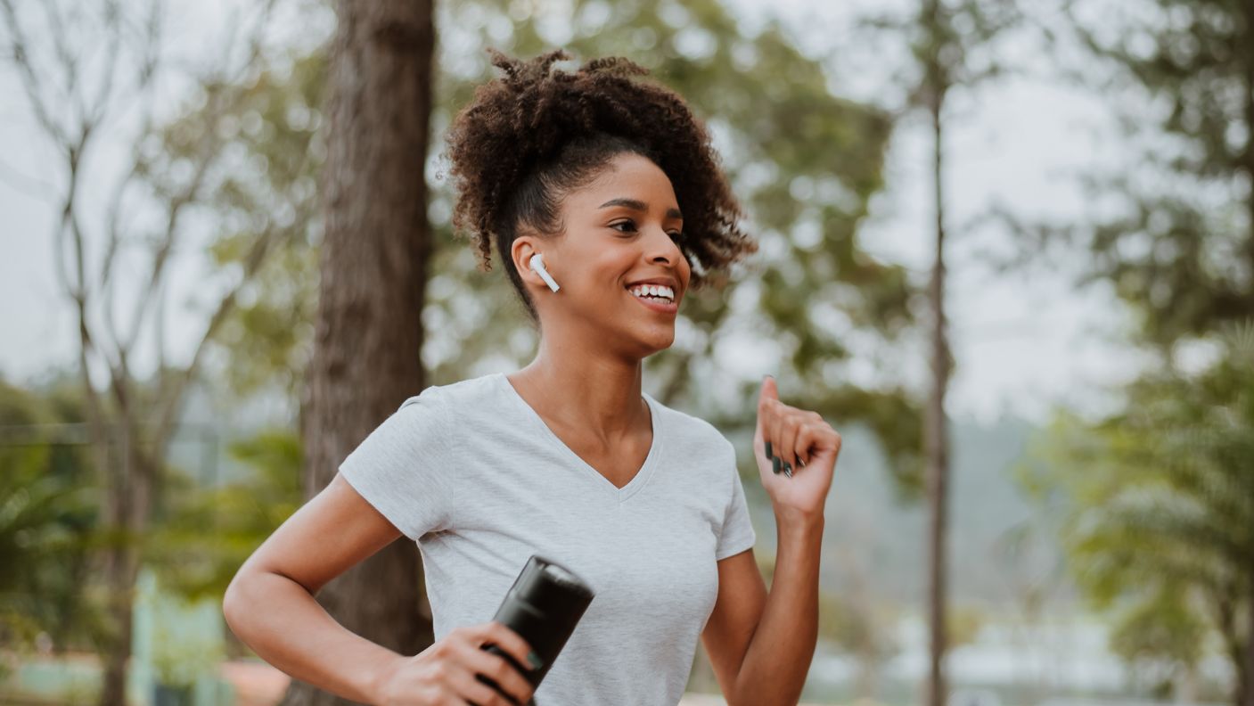 Woman smiling while on a run