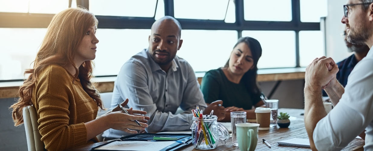 Group of people meeting at a table