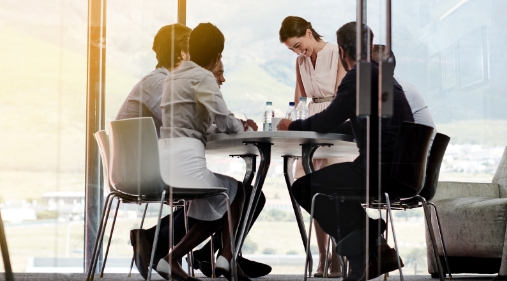 Employees meeting in at a table