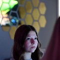 A teen looking intently