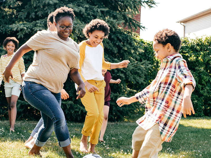 Kids outside playing soccer