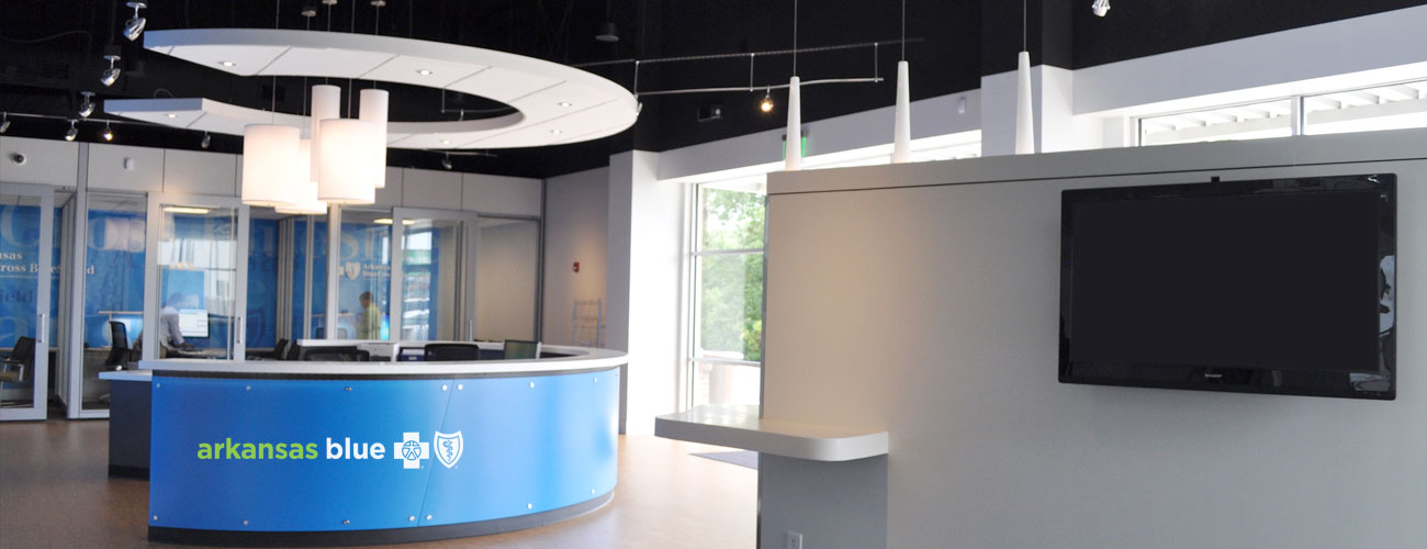 Arkansas bluestore locations interior with a round desk in the center.